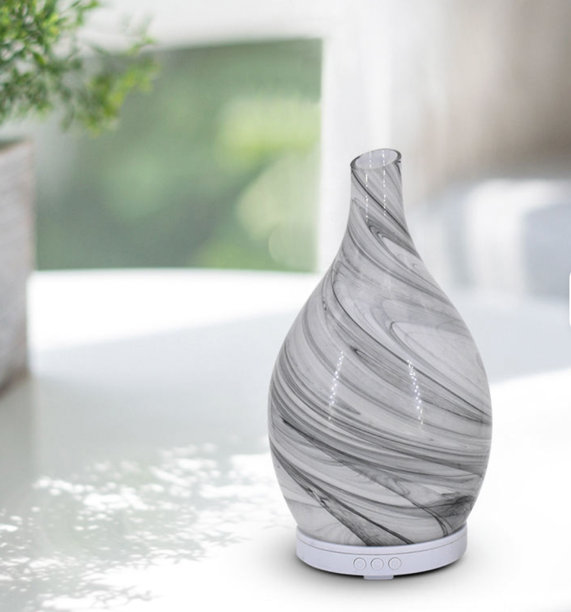Diffuseur d'arômes en verre rotatif